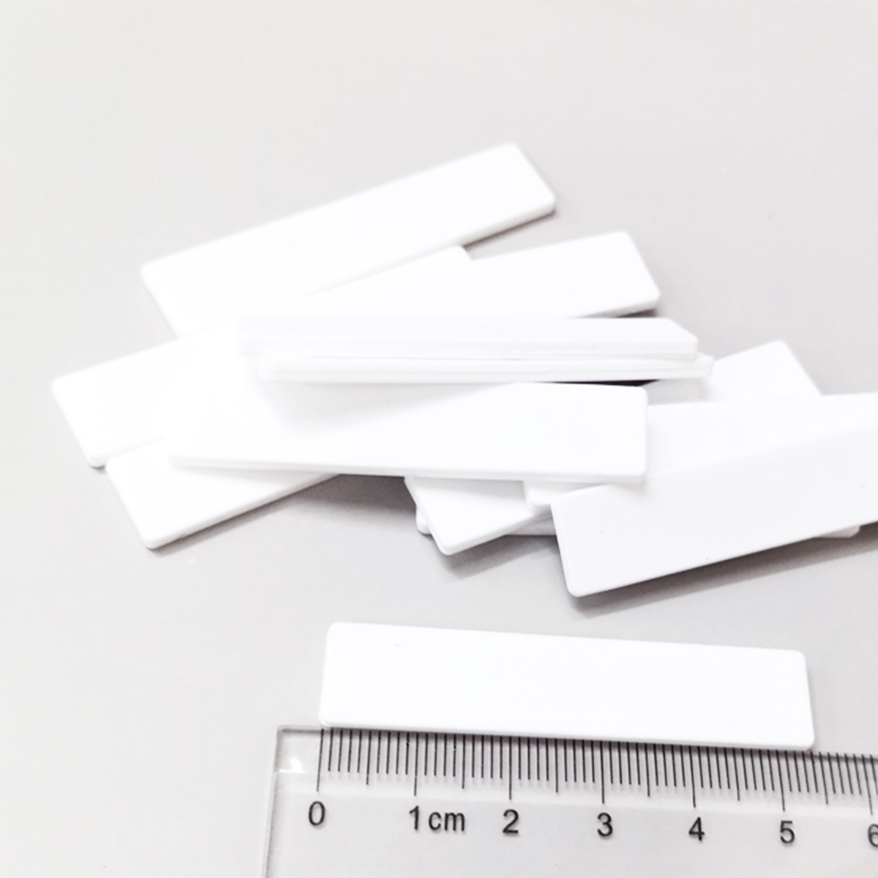 Étiquette RFID en silicone UHF 860-960 MHz pour le linge JT-F5512